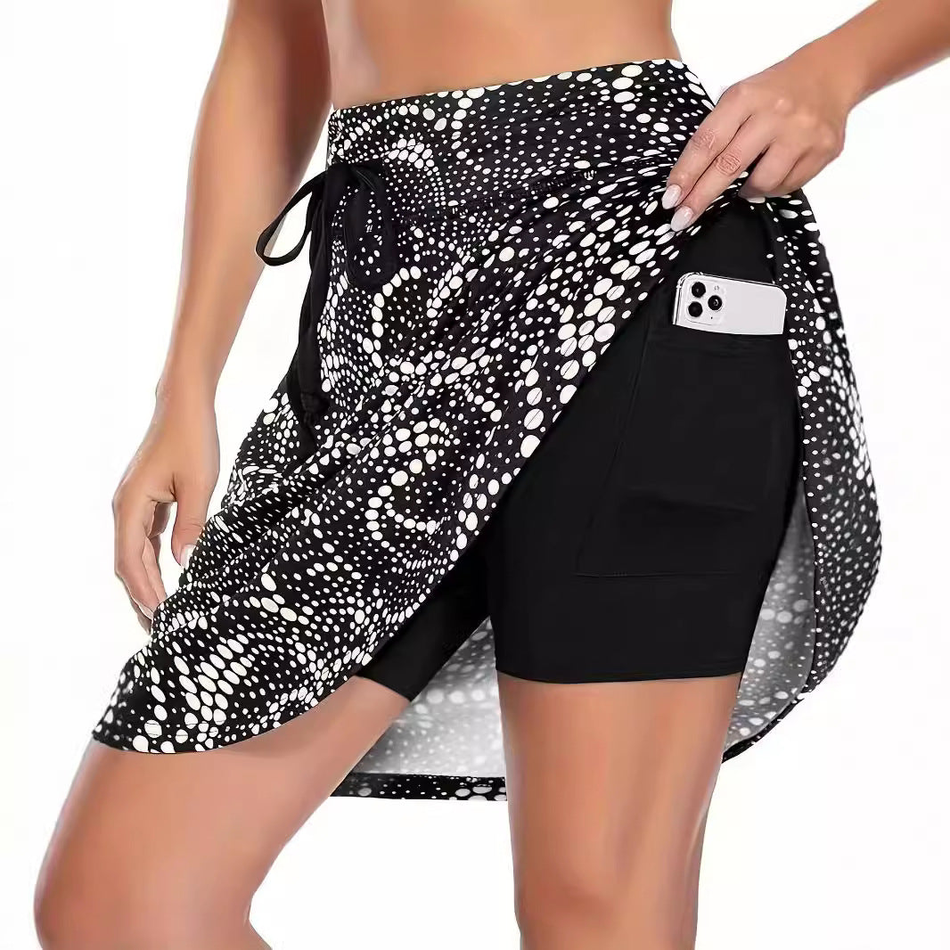 Damen funktionelle Strandshorts mit floralem Überwurf W&W Mode