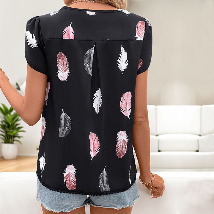 Damen Bluse mit romantischen Federmuster und Puffärmeln W&W Mode