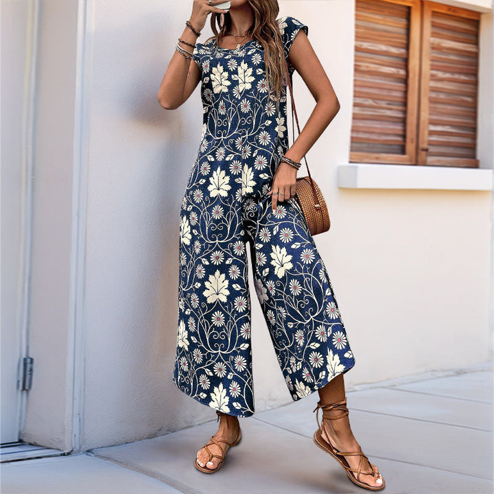 Damen Jumpsuit mit floralem Design und kastanienbraunem Bindegürtel W&W Mode