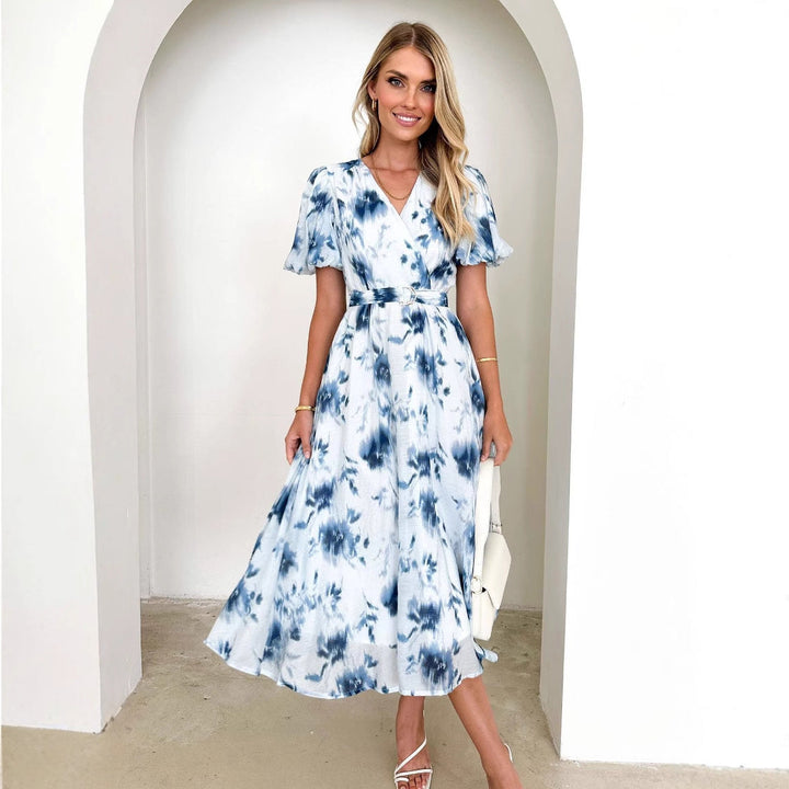 Damen Midikleid mit tailliertem Schnitt, voluminösen Ärmeln und elegantem Wellenmuster W&W Mode