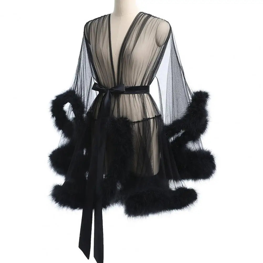 Damen Kleid aus transparentem Tüll mit Federsaum und Satinband