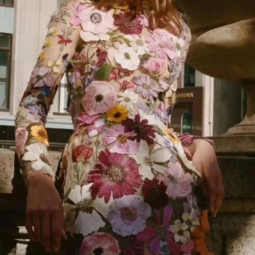 Damen Minikleid mit floralen Applikationen und durchscheinender Optik