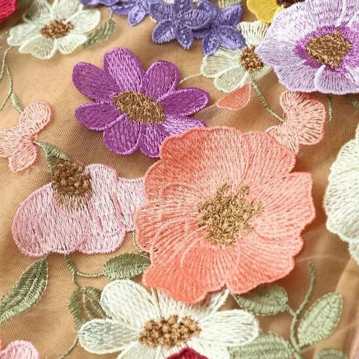 Damen Minikleid mit floralen Applikationen und durchscheinender Optik