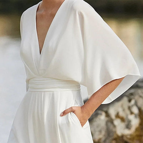 Eleganter Jumpsuit mit V-Ausschnitt