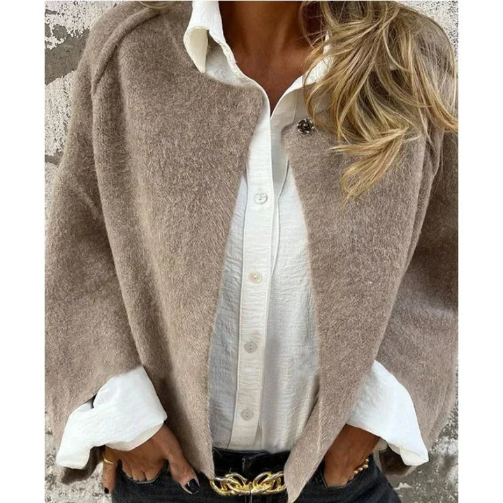 – Stilvolle mittellange Jacke